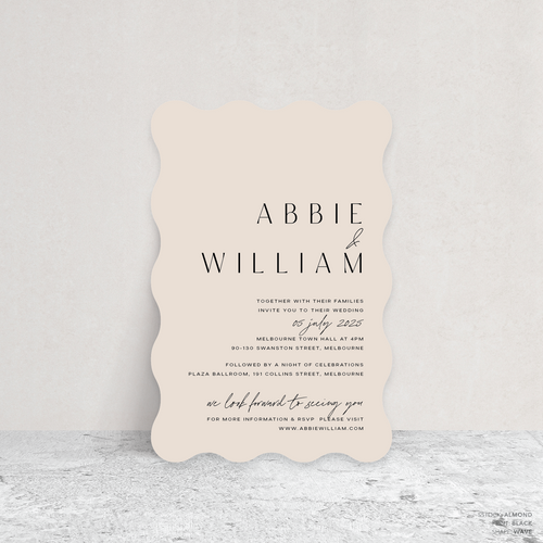 Wave shape flat lay of Abbie wedding invitation with clean, elegant layout and timeless typography, styled with a minimalist aesthetic.