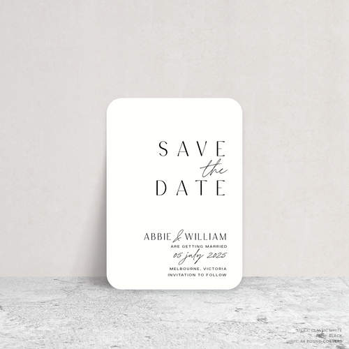 Round Corner shape flat lay of Abbie wedding save the date with clean, elegant layout and timeless typography, styled with a minimalist aesthetic.