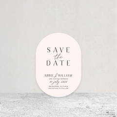 Double Arch shape flat lay of Abbie wedding save the date with clean, elegant layout and timeless typography, styled with a minimalist aesthetic.