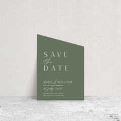 Angle shape flat lay of Abbie wedding save the date with clean, elegant layout and timeless typography, styled with a minimalist aesthetic.