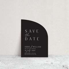 Sail shape flat lay of Abbie wedding save the date with clean, elegant layout and timeless typography, styled with a minimalist aesthetic.