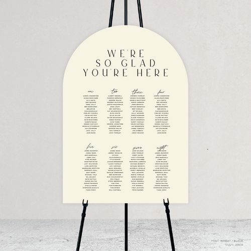 Arch shape flat lay of Abbie wedding seating chart with clean, elegant layout and timeless typography, styled with a minimalist aesthetic.