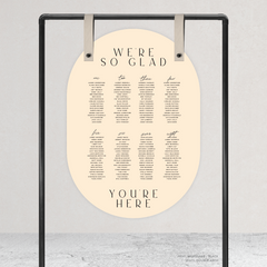 Double Arch shape flat lay of Abbie wedding seating chart with clean, elegant layout and timeless typography, styled with a minimalist aesthetic.