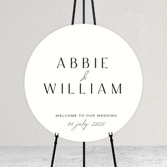 Round shape flat lay of Abbie wedding welcome sign with clean, elegant layout and timeless typography, styled with a minimalist aesthetic.