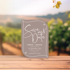 Double Up shape flat lay of semi-custom Vino wedding save the date with hand-drawn vineyard-inspired border.