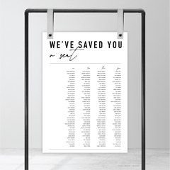 Rectangle shape flat lay of Never Let You Go wedding seating chart featuring bold and delicate typography with modern, expressive layout and semi-custom design.