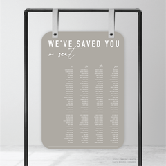 Round Corner shape flat lay of Never Let You Go wedding seating chart featuring bold and delicate typography with modern, expressive layout and semi-custom design.