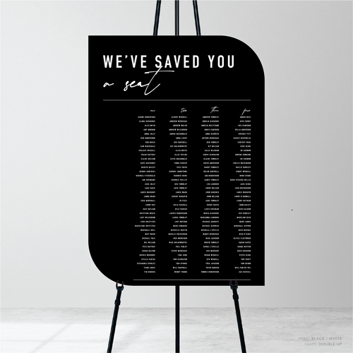 Double Up shape flat lay of Never Let You Go wedding seating chart featuring bold and delicate typography with modern, expressive layout and semi-custom design.