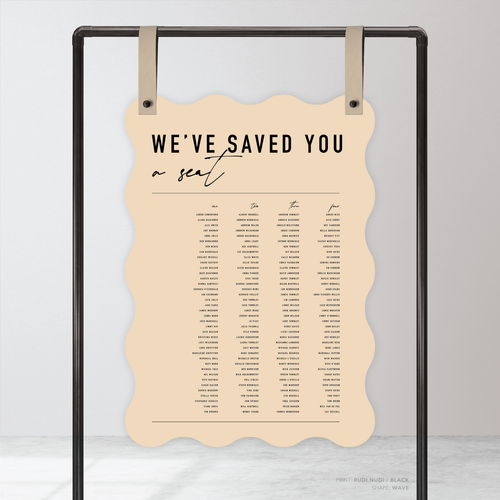 Wave shape flat lay of Never Let You Go wedding seating chart featuring bold and delicate typography with modern, expressive layout and semi-custom design.