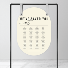 Double Arch shape flat lay of Never Let You Go wedding seating chart featuring bold and delicate typography with modern, expressive layout and semi-custom design.