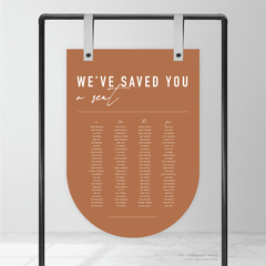 Bottom Arch shape flat lay of Never Let You Go wedding seating chart featuring bold and delicate typography with modern, expressive layout and semi-custom design.