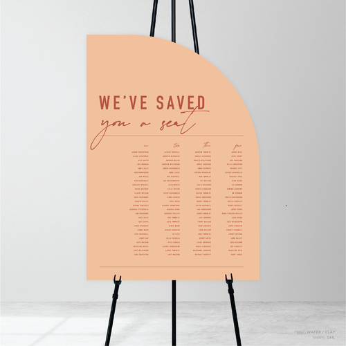 Sail shape flat lay of Never Let You Go wedding seating chart featuring bold and delicate typography with modern, expressive layout and semi-custom design.
