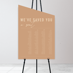 Angle shape flat lay of Never Let You Go wedding seating chart featuring bold and delicate typography with modern, expressive layout and semi-custom design.