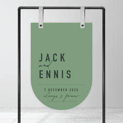 Bottom arch shape flat lay of Never Let You Go wedding welcome sign featuring bold and delicate typography with modern, expressive layout and semi-custom design.